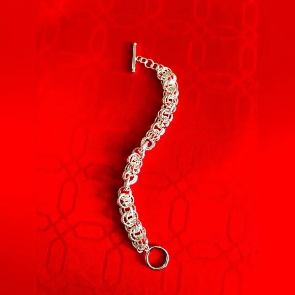 NEW 925 STERLING SILVER INTERWOVEN CIRCLES
BRACELET WITH TOGGLE CLASP  … - Picture 7 of 7